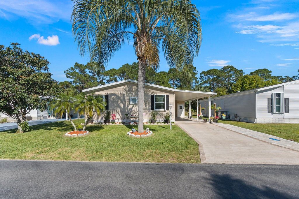 Photo of 352 Tropical Isles Circle, Fort Pierce, FL 34982 (MLS # R10956711)