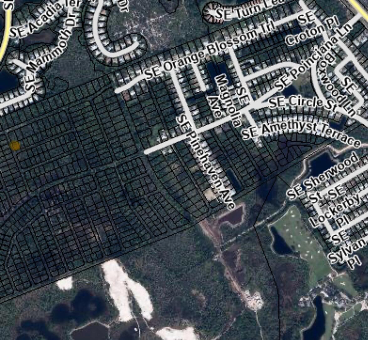 Poinciana Gardens vacant lot in Martin County. Currently no paved roads. It's zoned vacant residential. No HOA. .255 acre corner lot. Great location off US1. Close to beaches, downtown Hobe Sound and Stuart, restaurants and shopping! Buyer to do due diligence.