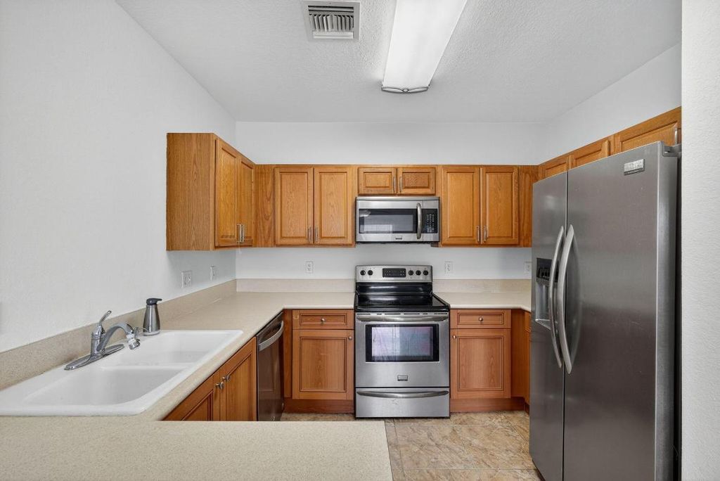 Photo of 513 Talia Circle, Palm Springs, FL 33461 (MLS # R11140370)