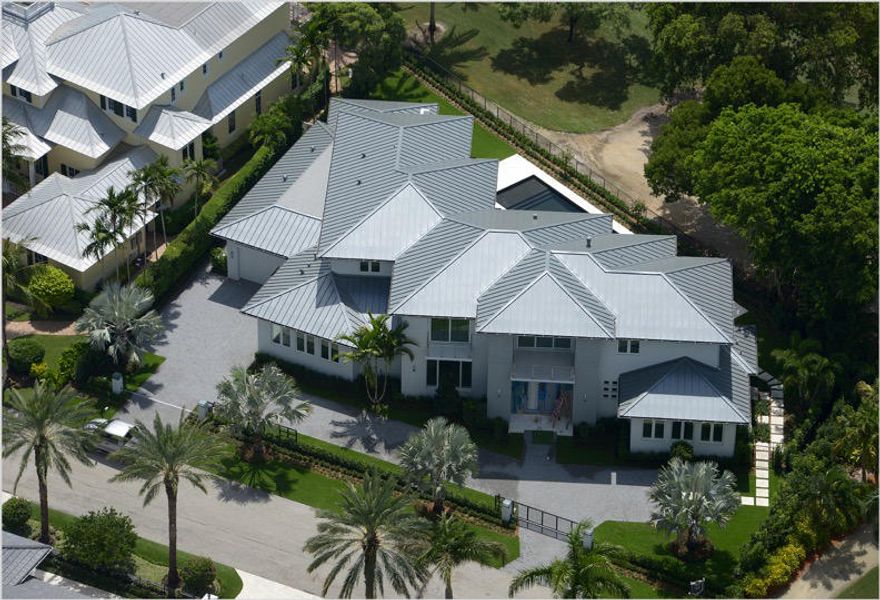 ''Brand New'' Gated Modern Coastal-inspired golf course estate sited on an amazing 165 ft. +/- at Royal Palm's  1st fairway by Compson Development and architecture by Randall Stofft.  An expansive motor court ushers guests to sleek stainless steel double doors which open to this architectural estate encased in glass, steel and stone.  Resort-style pool/patio overlooking spectacular SE fairway views.  Shown by appointment only.