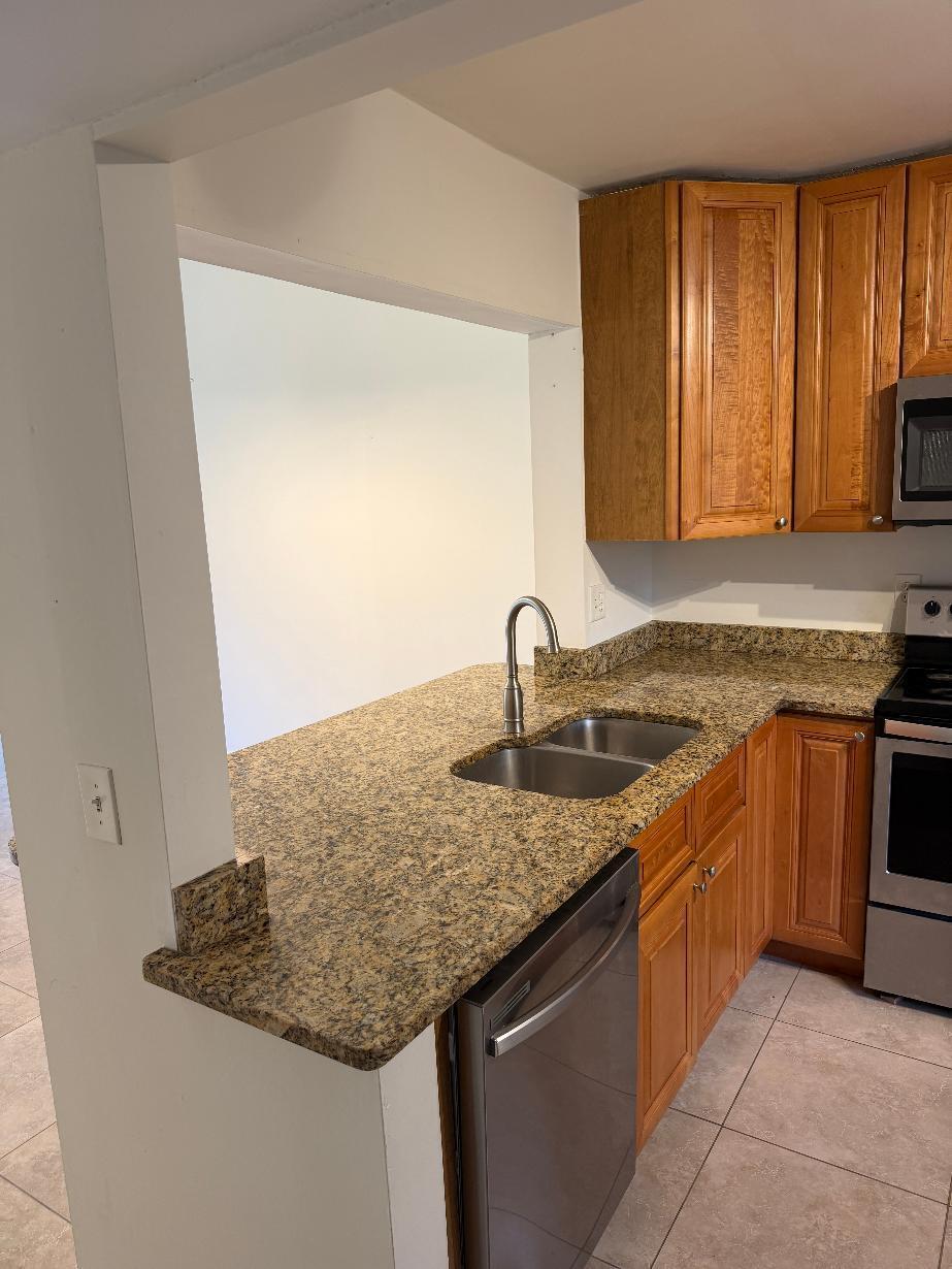 Photo of 21943 REMSEN Terrace #203, Boca Raton, FL 33433 (MLS # B26093840)