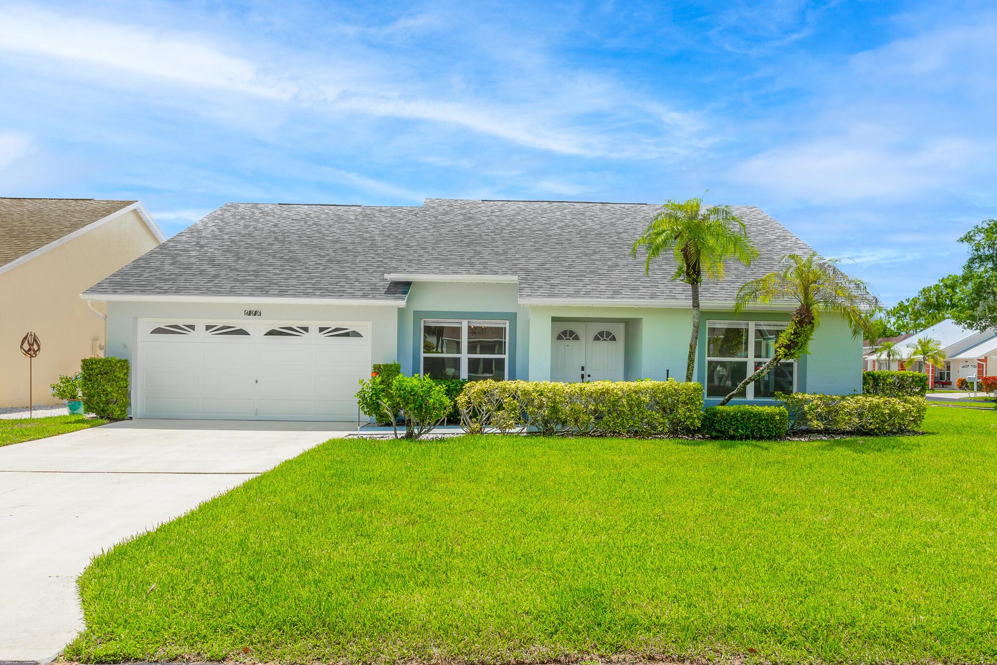 Let's Make a Deal/ Motivated Seller. St Lucie West Stunner, Completely Renovated/ Updated! Check Out This 2 Bed/ 2 Bath/ 2 Car Garage in Kings Isle, Beautiful Laminate Flooring Throughout, Upgraded Kitchen and Bathrooms. On an Oversized Corner Lot. New Doors on Attached Shed, Newer Appliances, New Roof Installed in January 2025. The Kitchen Has Beautiful Solid Surface Counters and All Newer Appliances. The Spacious Main Bathroom Features a Walk-In Shower, Dual Sinks and All New Faucets, Solid Surface Counter Tops. HOA Fees Includes Cable, Internet, Lawn, Clubhouse, Pool, Gated with Guard, and More. Set Up Your Private Showing Today!