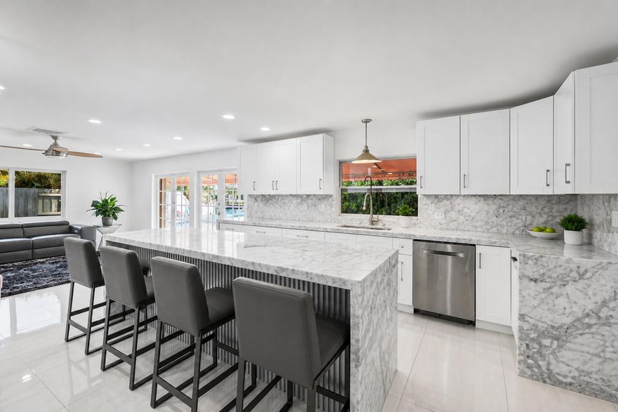 Stunning waterfront residence in the heart of Lighthouse Point! This beautifully renovated home offers 30 feet of dockage with quick ocean access and no fixed bridges, just minutes to the inlet, making it a true boater's paradise. Positioned on one of the most desirable streets in Lighthouse Point, this home delivers both prestige and lifestyle. The private backyard retreat features a well-placed swimming pool, creating the perfect setting for entertaining or relaxing in complete tranquility. Inside, the home has been fully renovated with high-end finishes, including premium appliances and tile flooring throughout, offering a sleek, modern, move-in-ready space filled with natural light. This corner lot home is Ideally located just steps Placide Park, residents enjoy convenient access to tennis courts, sports fields, and open green space. This property is the perfect combination of waterfront luxury, prime location, and effortless South Florida living, an exceptional opportunity in one of Broward County's most sought-after boating communities.  DISCLAIMER: Information published or otherwise provided by the listing company and its representatives, including but not limited to prices, measurements, square footages, lot sizes, calculations, statistics, photos and videos, is deemed reliable but is not guaranteed and is subject to errors, omissions, or changes without notice. All such information should be independently verified by any prospective purchaser or seller. Parties should perform their own due diligence prior to a sale or listing. The listing company expressly disclaims any warranty or representation regarding such information. Prices published reflect list price, sold price, and/or last asking price. The listing company participates in the Multiple Listing Service and IDX.