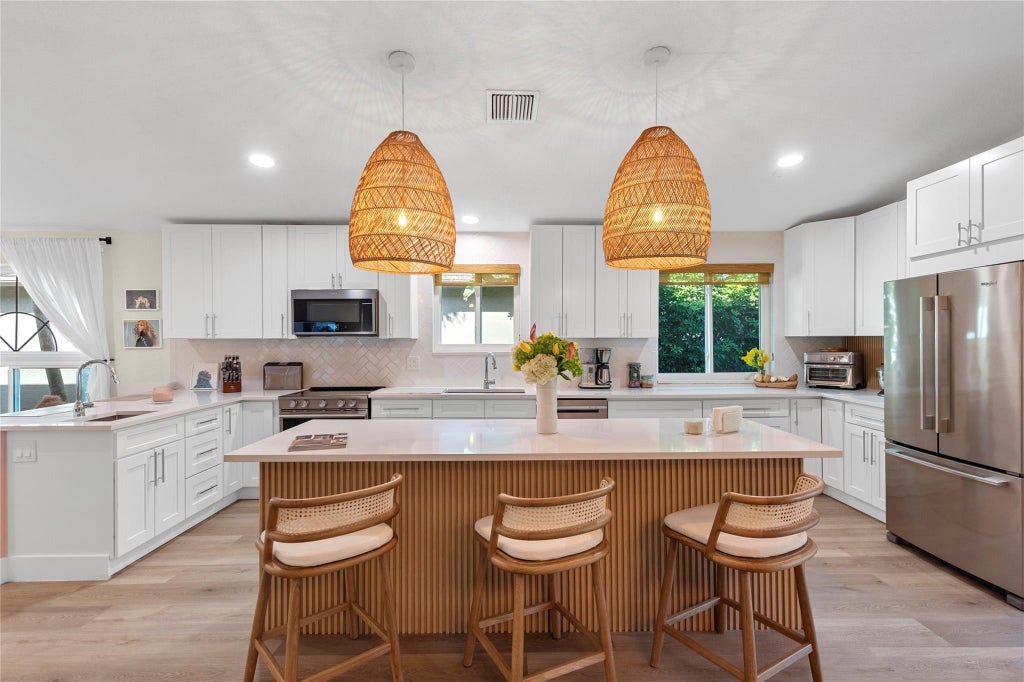 Photo of 4123 NW 2nd Lane, Delray Beach, FL 33445 (MLS # F10485943)