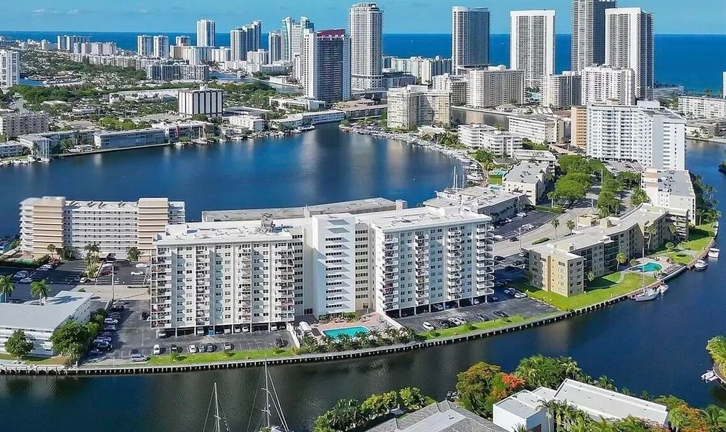 Photo of 401 Golden Isles Drive #409, Hallandale Beach, FL 33009 (MLS # R11160328)