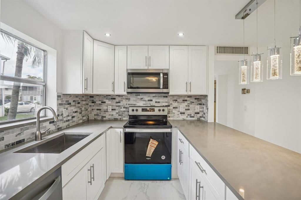 Photo of 100 Monaco C, Delray Beach, FL 33446 (MLS # R11151316)