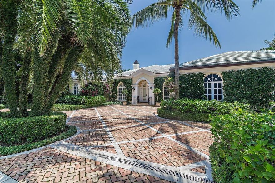 Welcome to 232 Sandpiper Road. Sandpiper Road is a premium north end street with deeded beach as well as easy lake trail access. As you drive up to this Chicago brick motor court surrounded by beautiful grounds, two double doors greet you to this elegant single-story Bermuda residence. Built in 2002, well maintained with many improvements, this home offers a gracious and flexible floorplan, rooms beautifully appointed, 12' ceilings throughout, gas operated fireplaces, hard wood floors, as well as many other quality finishes. Private and serene, French doors open onto the loggia and pool area, offering the best of indoor and outdoor entertainment.