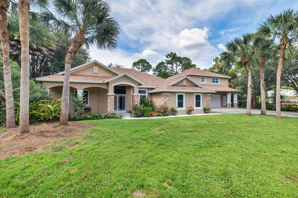 Photo of 13001 Mallard Creek Drive, Palm Beach Gardens, FL 33418 (MLS # R11074363)