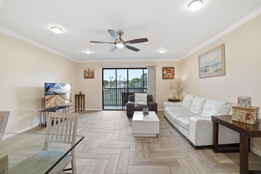 Photo of 105 Deer Creek Road, Deerfield Beach, FL 33442 (MLS # B26024599)