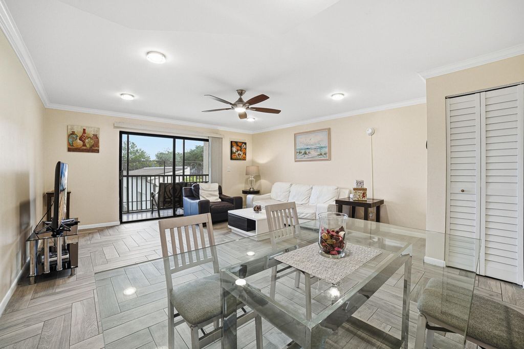 Photo of 105 Deer Creek Road, Deerfield Beach, FL 33442 (MLS # B26024599)