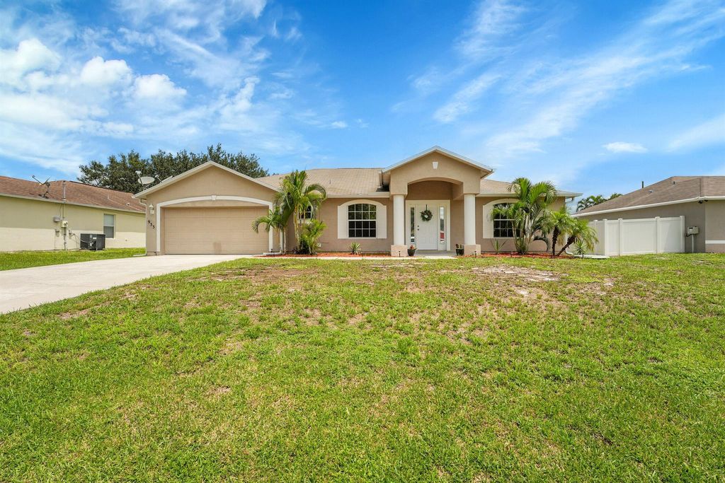 Photo of 933 SE Caravan Avenue, Port Saint Lucie, FL 34983 (MLS # R11107962)