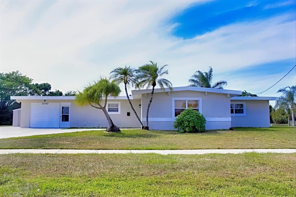 Photo of 3040 SE Overbrook Drive, Port Saint Lucie, FL 34952 (MLS # R10718647)