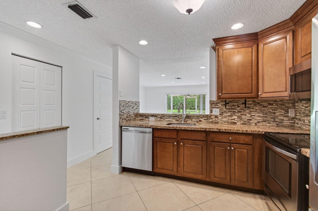 Photo of 9850 Kamena Circle, Boynton Beach, FL 33436 (MLS # R11099478)