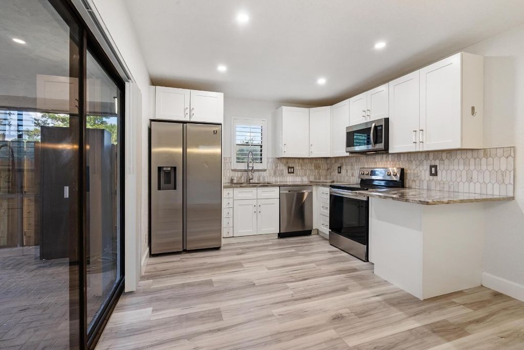 Photo of 7780 Courtyard Run, Boca Raton, FL 33433 (MLS # F10546828)