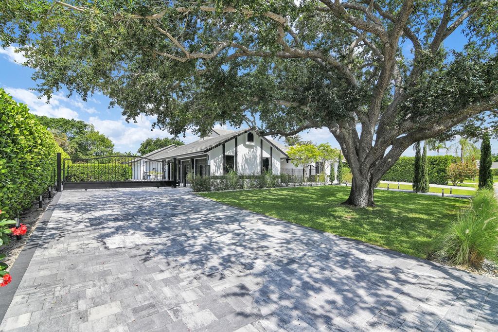 Photo of 21082 Sweetwater Lane N, Boca Raton, FL 33428 (MLS # R11093377)