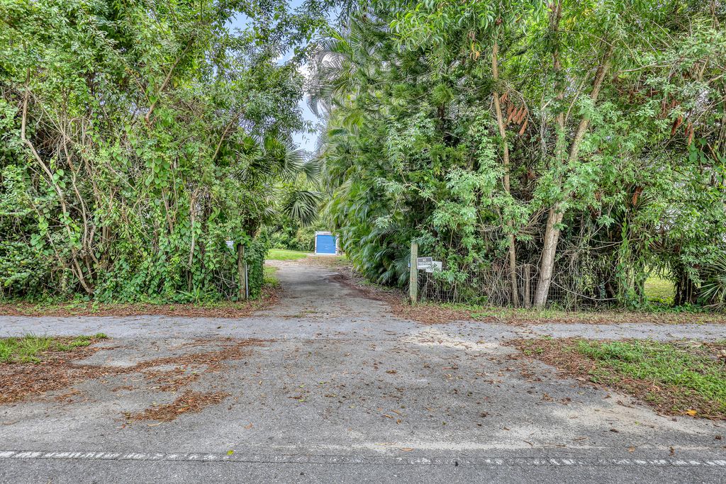 Photo of 13835 44th Place N, The Acreage, FL 33411 (MLS # R11111357)