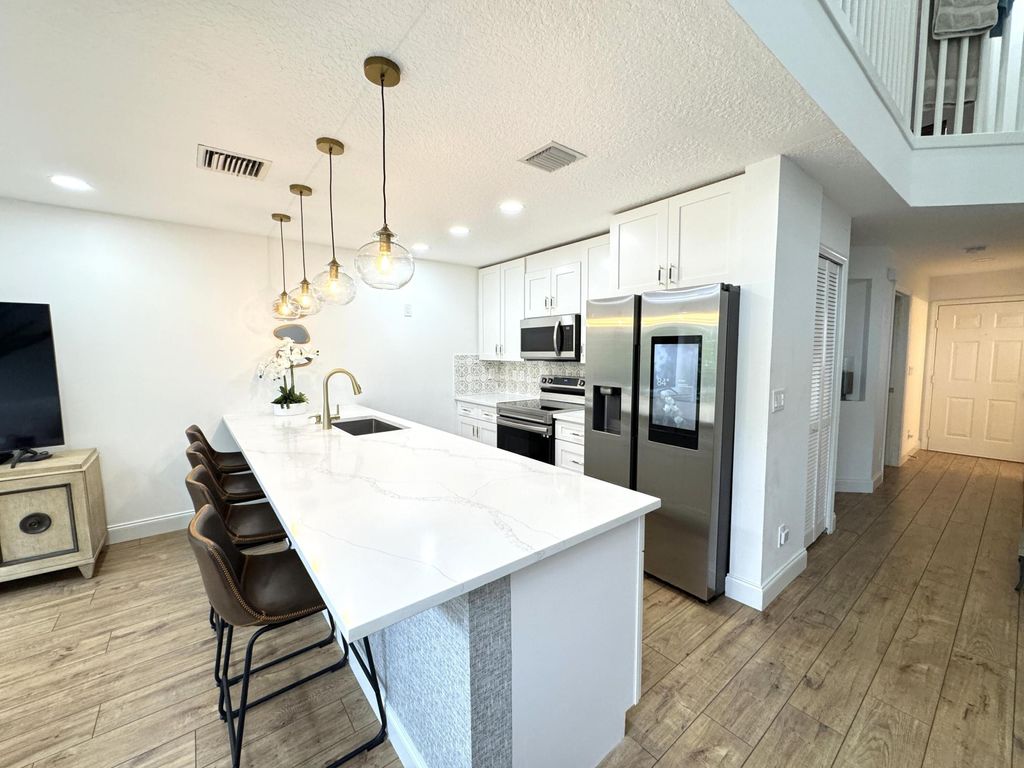 Photo of 12838 Woodmill Drive, Palm Beach Gardens, FL 33418 (MLS # R11096742)