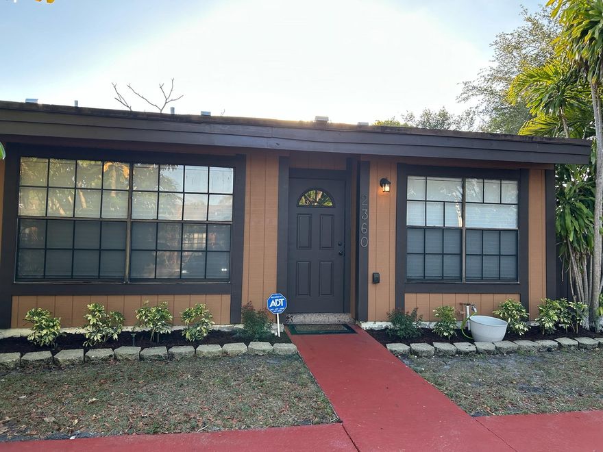 This spacious and updated residence sits on a large corner lot with a fenced-in yard—perfect for outdoor living. Enjoy the convenience of two dedicated parking spaces right in front of the unit.
Inside, the home features luxury vinyl flooring in both bedrooms, each with oversized walk-in closets. The extra-large primary suite boasts soaring vaulted ceilings with exposed beams and a fully renovated en-suite bathroom (2024). The open-concept living and dining area also features vaulted ceilings with exposed beams, creating a light, airy feel throughout. Additional upgrades include:New A/C (2024) Updated guest bathroom Fresh interior paint New vertical blinds on sliding doors and faux wood blinds throughout. All exterior fascia and siding replaced (2025)