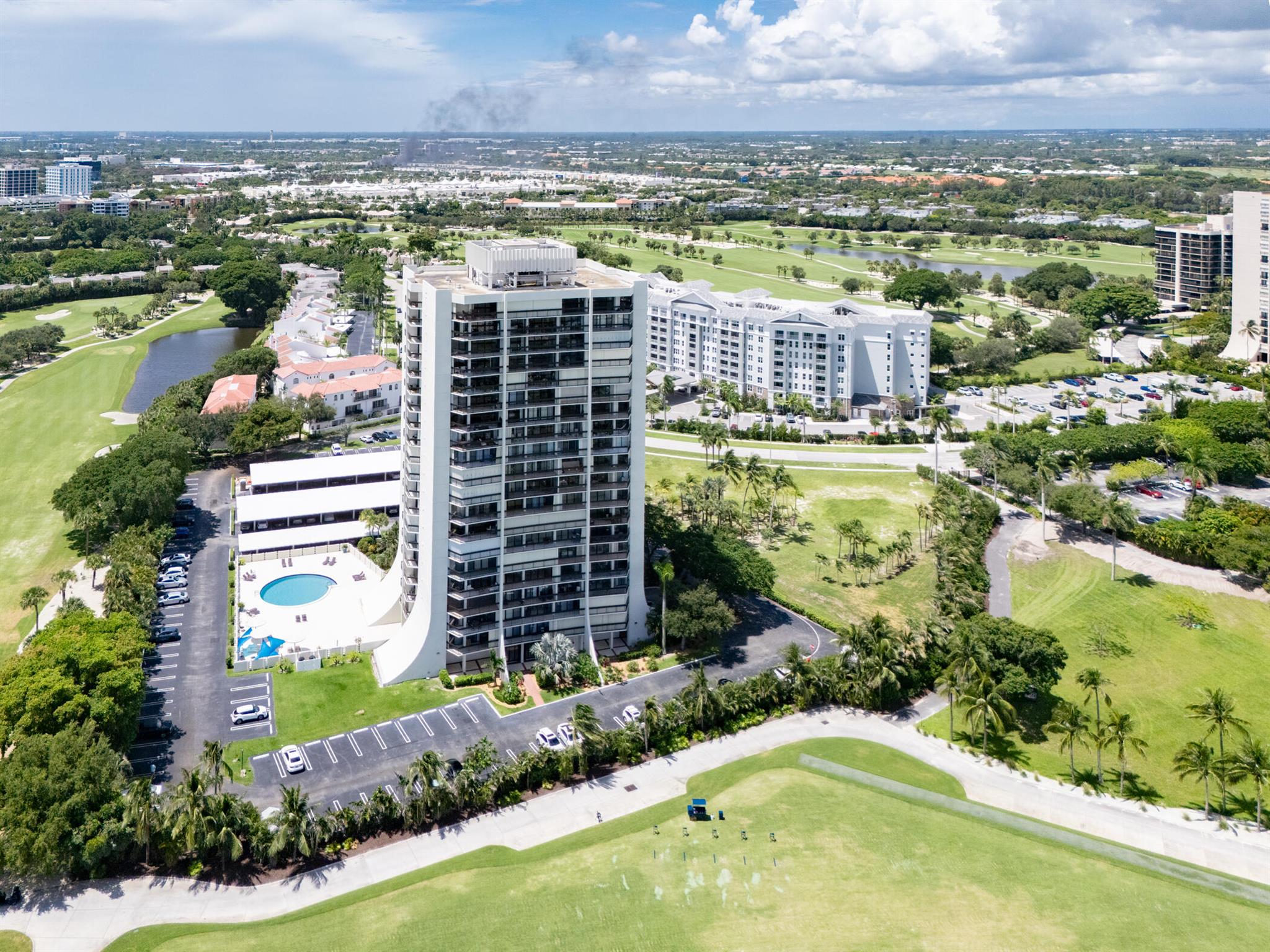 Enjoy the Magnificent panoramic views of the Golf Course in this beautiful open 2 bedroom 2 bath corner unit located in the prestigious gated community of Lands of the President. Views are great day and night as at night you'll get the beautiful lights from the city & Outlets. This condo is move in ready & has floor to ceiling sliding doors, hurricane shutters & has 2 balconies for plenty of outdoor living. Newer air conditioner, Granite counter tops, beautiful laminate flooring & freshly painted. Unit has 2 parking spaces 1 covered & 1 uncovered. Doorman building with manager on site in gated community. HOA fee Includes Cable, water, Fitness center, party room and beautiful pool. Great location near I-95, Tanger outlets, Beaches, Palm beach airport, City place & downtown West Palm Beach