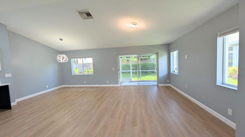 Photo of 790 NW 42nd Place, Deerfield Beach, FL 33064 (MLS # R11106033)