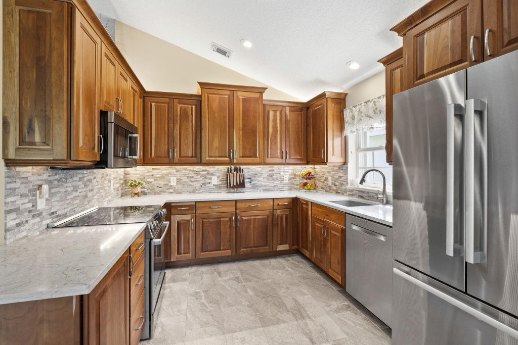 Photo of 4310 SE SCOTLAND CAY Way, Stuart, FL 34997 (MLS # B26057898)