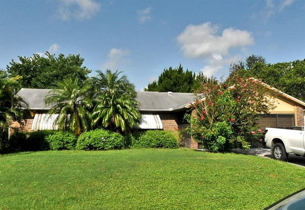 Photo of 2066 SW Castinet Lane, Port Saint Lucie, FL 34953 (MLS # R10756194)