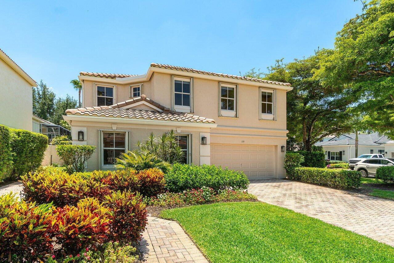 Spend next Winter Season in paradise at Award Winning BallenIsles Country Club and Community. 130 Sunset Cove Lane awaits your arrival! At 2,613 square feet, this two story, 4BR/3BA plus Open Loft office is extremely spacious to spend time next winter in warm and sunny Florida! The home is meticulously maintained throughout. Vaulted ceilings, countless oversized windows and sliding glass doors offer a bright and airy interior. The main Level features 3 separate living areas, kitchen/dining area, large Primary Suite (King Bed) and one Guest Room (queen bed) at the opposite end of the home. The second floor offers two additional Guest Rooms providing added privacy from the first level. In addition, an Open Loft Office with desk/sitting area is an added bonus