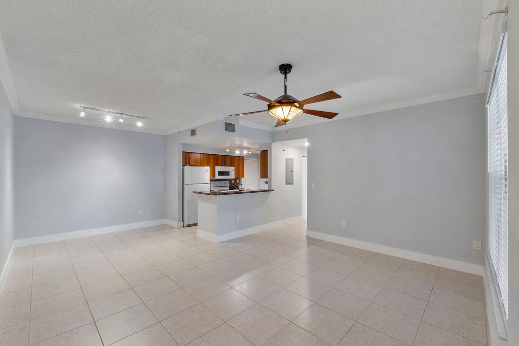 Photo of 5980 W Sample Road #104, Coral Springs, FL 33063 (MLS # B26033576)
