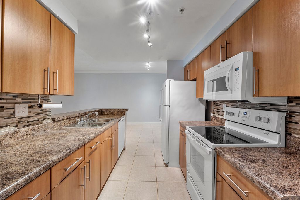 Photo of 5980 W Sample Road #104, Coral Springs, FL 33063 (MLS # B26033576)