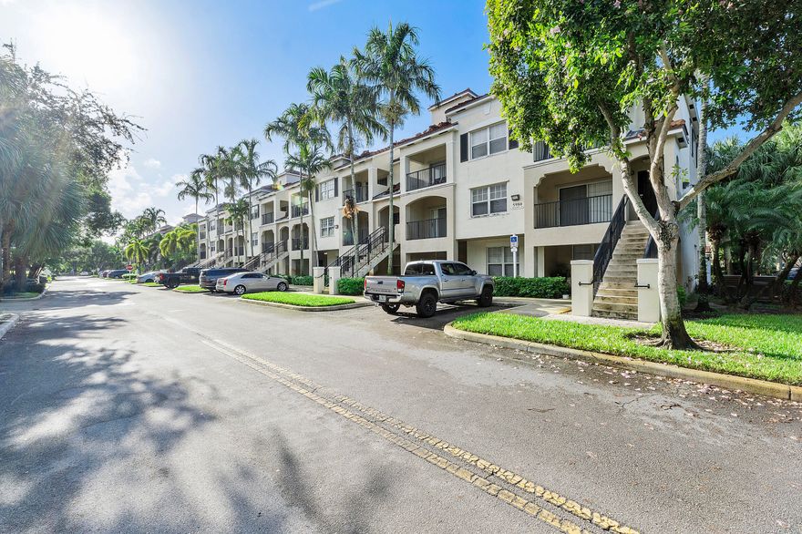 1st floor  with an attached garage 2 bedrooms, 2 bathrooms, no stairs in the GATED Ed Poinciana in Coral Springs. .  Crown molding in living room and tile throughout. Can be rented after 1st year of ownership. Pet friendly, maintenance includes basic cable, water, pool, fitness center and club house.