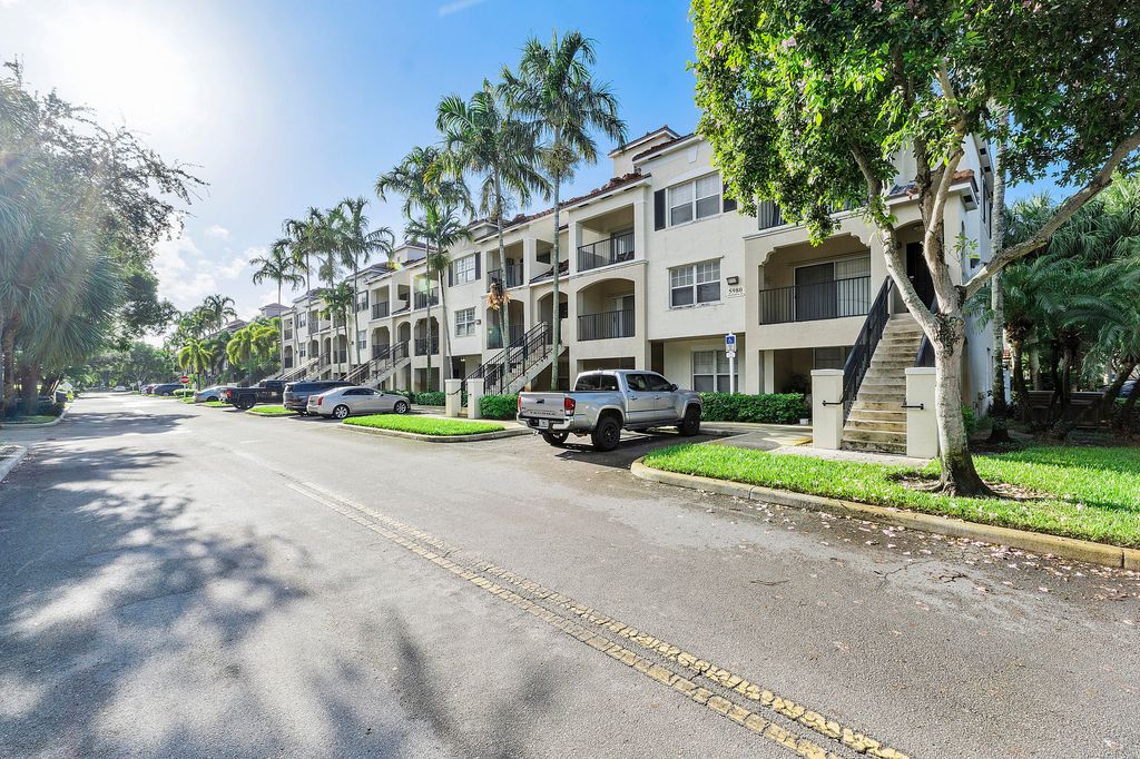 Photo of 5980 W Sample Road #104, Coral Springs, FL 33063 (MLS # B26033576)