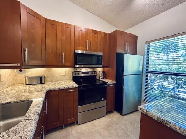 Photo of 3054 S OAKLAND FOREST Drive #2206, Oakland Park, FL 33309 (MLS # B26079808)