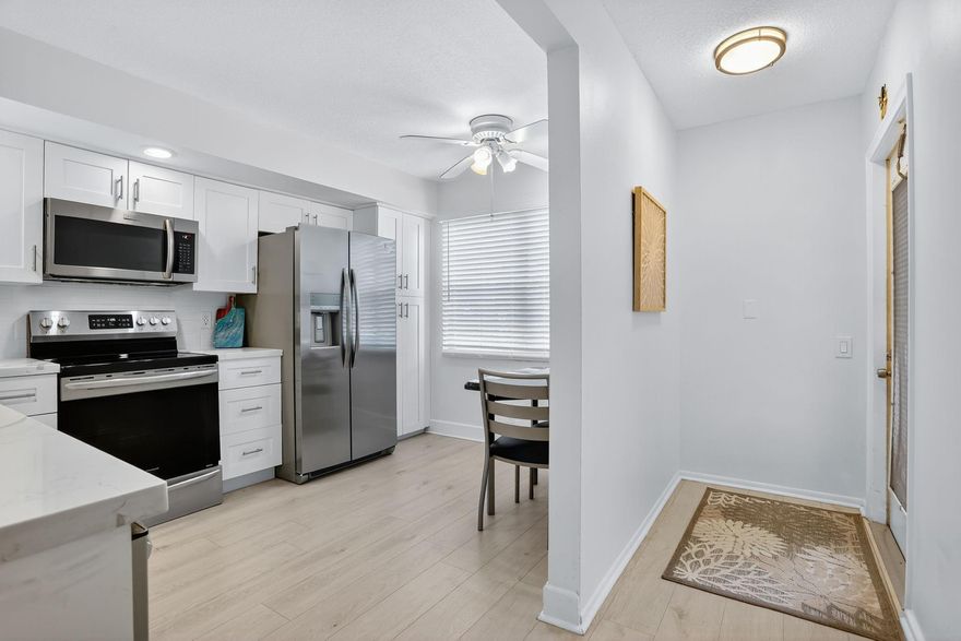 Remodeled First Floor Corner, Move in Ready Beautiful Garden View 2 Bedrm/2 Bathrm Condo in Wynmoor Golf Village. Resort-Style Living at Its Best! Highly sought-after community, offering a perfect blend of Comfort & Style. Bright & Airy, & Tastefully Decorated, Ideal for Year-round Living or a Seasonal Escape. Unique benefits featuring Patio looking out to the Beautiful Garden that floods the space with Natural Light & Provides Serene Views. Perfect for morning coffee or evening relaxation. Kitchen boasts Updated Appliances, & Custom Cabinets with Granite Counters. Gated community-residents enjoy a wealth of amenities like a Championship Golf Course, Restaurant, Fitness Center, Pools, Theater, Tennis, Pickleball, Free Cable TV, Courtesy Transportation-7 Miles to Revitalized Pompano Beach.