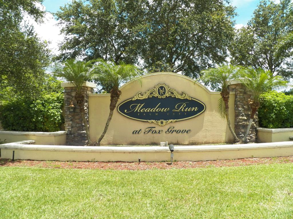Bring your horses to this beautiful, deed restricted, and gated equestrian community that has security cameras. Minimum of 3,000 square feet of air conditioned space homes. A highly desirable area of Martin County, this 5 acre PREPARED lot already has its own pond in the back yard. Additionally, this lot has two wide drainage right of ways; one on the right side and one behind the property. Lovely homes are next door and across the street. Each property has easements to ride horses around the community & there is a stocked 30 acre fishing lake to ride around. There are two county parks with equestrian trails nearby; ride your horse(s) to them; no need to use a trailer. Enjoy the benefits that acreage in the country affords, and simultaneously be close to town, I-95 & Turnpike.