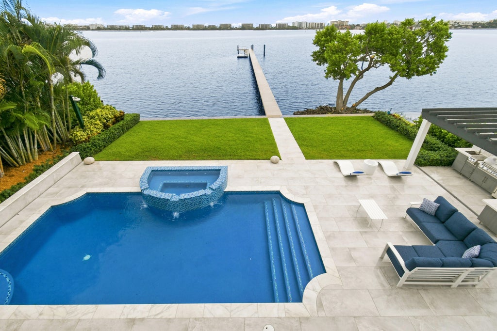 Photo of 3 Lakeside Palms Court, Lake Worth Beach, FL 33460 (MLS # B26072185)