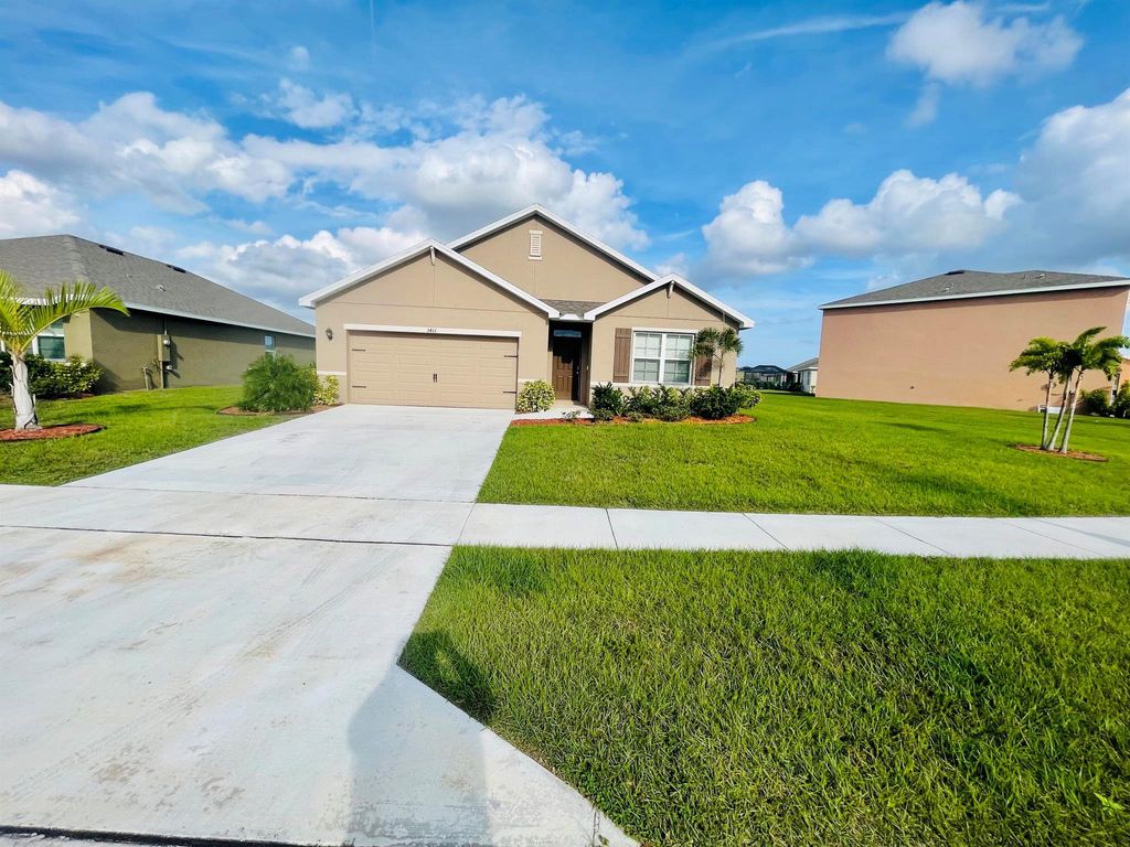 Photo of 3411 Trinity Circle, Fort Pierce, FL 34945 (MLS # R10940284)
