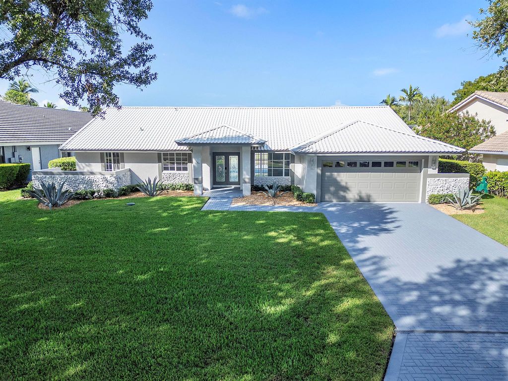 Photo of 6000 NW 63 Place, Parkland, FL 33067 (MLS # R11113299)