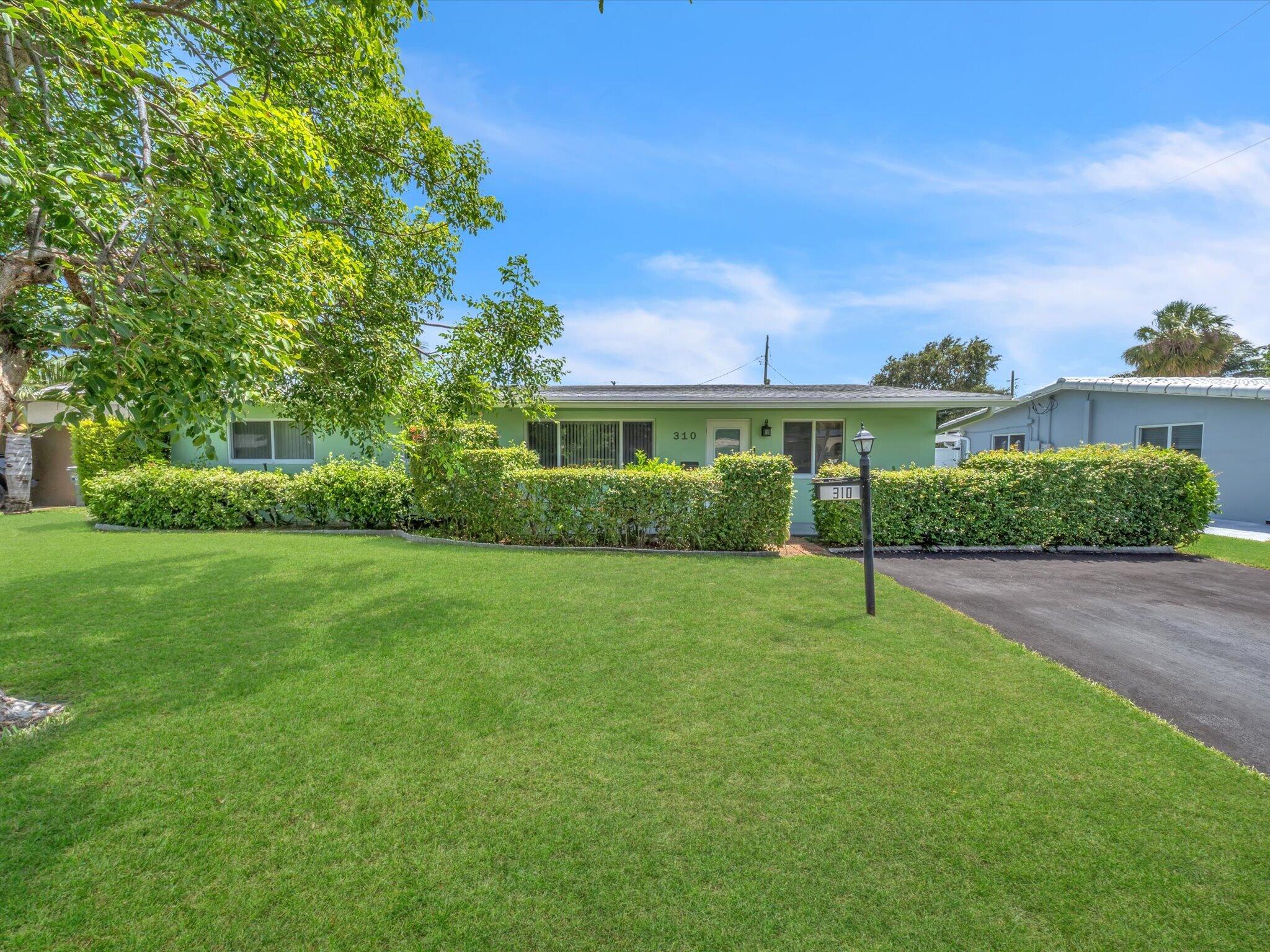 310 SE 8TH Court