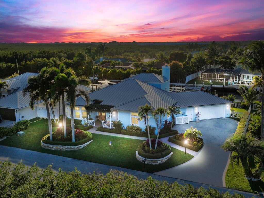 Photo of 115 Queens Road, Hutchinson Island, FL 34949 (MLS # R10963090)