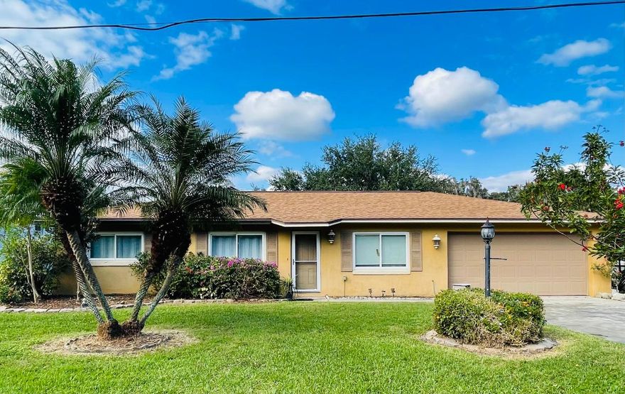 Come take a look at this nicely maintained 2-bedroom, 2-bathroom home nestled just steps from the shores of Lake Istokpoga. This 1,550 sq ft residence offers a split floor plan with en-suite bathrooms in both bedrooms, ensuring privacy and comfort.
Step inside to discover a spacious living room that flows seamlessly into the dining area and kitchen, complemented by a large family room that opens to a screened-in porch shaded by a majestic oak tree—ideal for relaxing afternoons.
The backyard is a true private oasis, featuring a cabana with ceiling fan and swing, and two versatile sheds—one for storage, the other for your workshop dreams. The fenced-in lot spans 0.25 acres. Walking distance to community center w/playground and fishing pier.