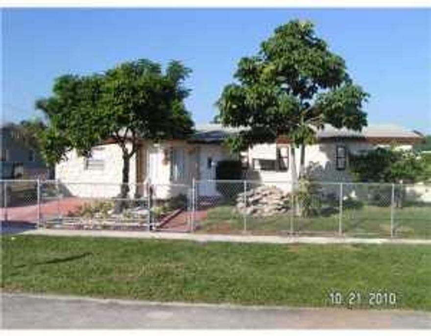 Three Bedrooms with a possible 4TH bedroom Two Bath