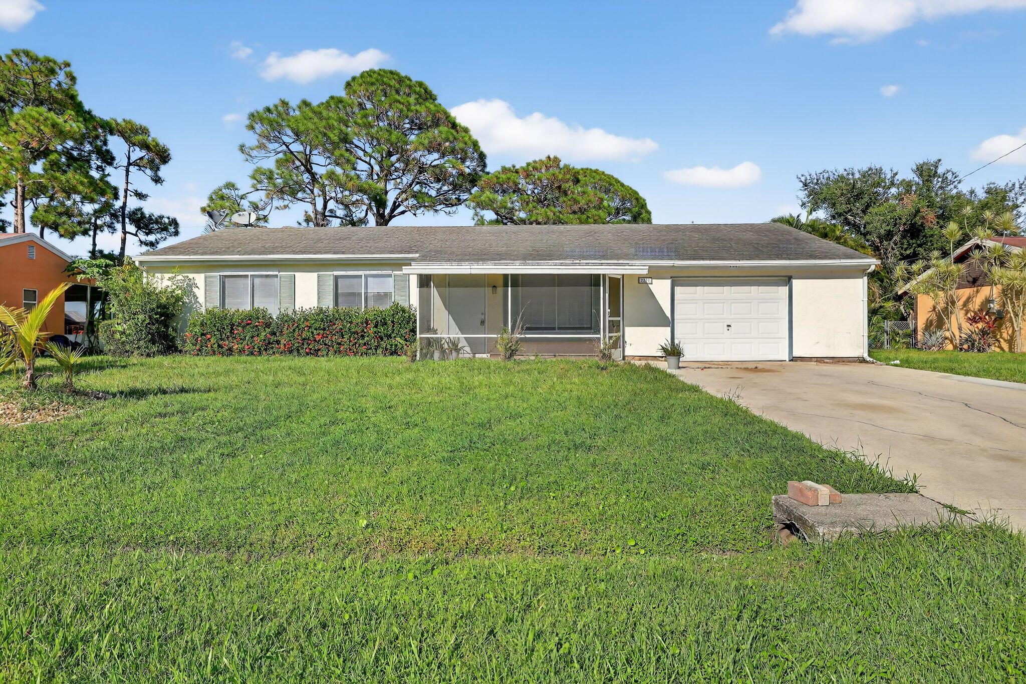 Newly renovated, lovely 3-bedroom, 2-bathroom home with bonus room. The open floor plan has tile throughout, and fresh paint that creates a bright, inviting atmosphere. Enjoy the spacious kitchen, screened patio and generous backyard, ideal for relaxation or entertaining friends and family. Centrally located near shopping and dining, this home is sure to impress!