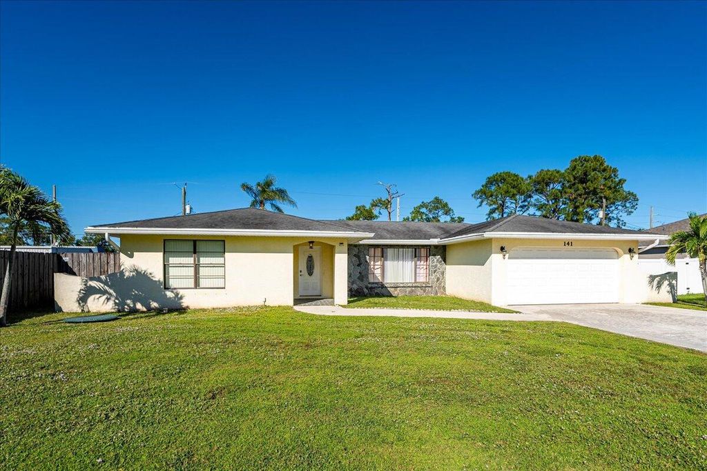 Photo of 141 SW Essex Drive, Port Saint Lucie, FL 34984 (MLS # R11039767)