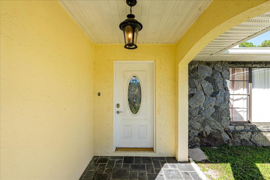 Photo of 141 SW Essex Drive, Port Saint Lucie, FL 34984 (MLS # R11039767)