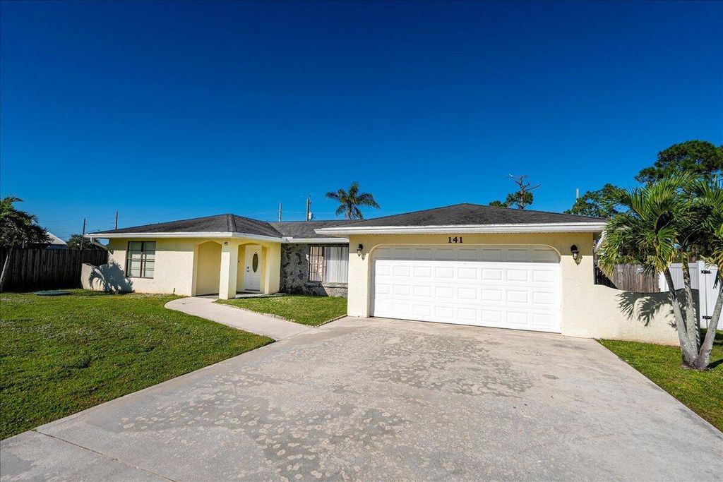 Photo of 141 SW Essex Drive, Port Saint Lucie, FL 34984 (MLS # R11039767)