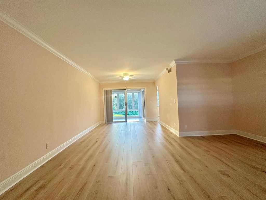 Photo of 33 Colonial Club Drive #203, Boynton Beach, FL 33435 (MLS # R11132718)
