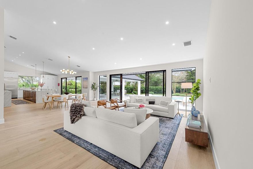 This completely renovated single-family home is perfectly situated on a beautifully mature, landscaped one-acre lot in the Aero Club with private air strip. Offering privacy, space, and modern luxury. Designed for effortless living and entertaining, the home features a brand-new chef's kitchen with ample storage and stunning finishes, while all four bedrooms include their own en-suite bathrooms for ultimate comfort and privacy. Vaulted ceilings and an abundance of natural light enhance the open, airy feel throughout, and a massive covered outdoor living area creates a seamless indoor-outdoor flow ideal for entertaining, overlooking a sparkling pool. Completing the property is a spacious three-car garage, making this exceptional home as functional as it is elegant.