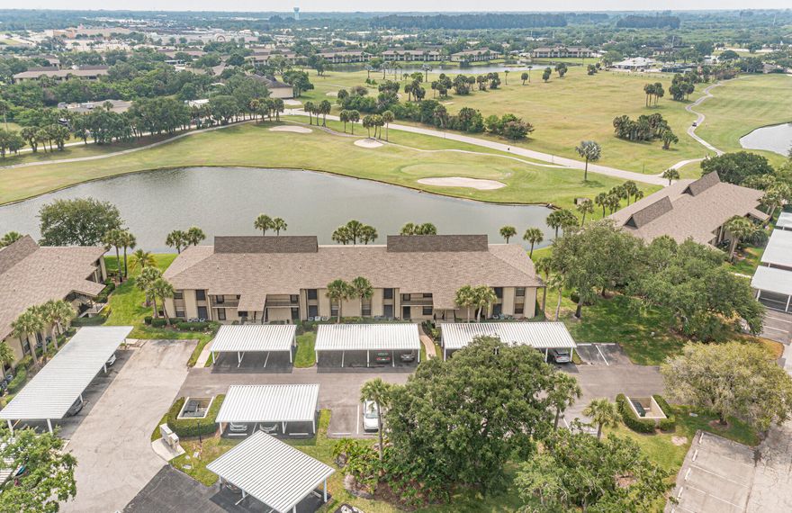 Enjoy stunning lake and golf course views in this 1,188 sq ft, 2-bed, 2-bath 1st-floor condo! Built with reinforced concrete walls & impact windows for peace of mind, it features a 2016 A/C, assigned covered parking, and access to a public golf course. Step outside to an active walking/biking community with fitness classes, a clubhouse, pools, and tennis. Located in Vero Beach, you're minutes from pristine beaches, dining, and shopping. Safety, community, and recreation in one perfect package!