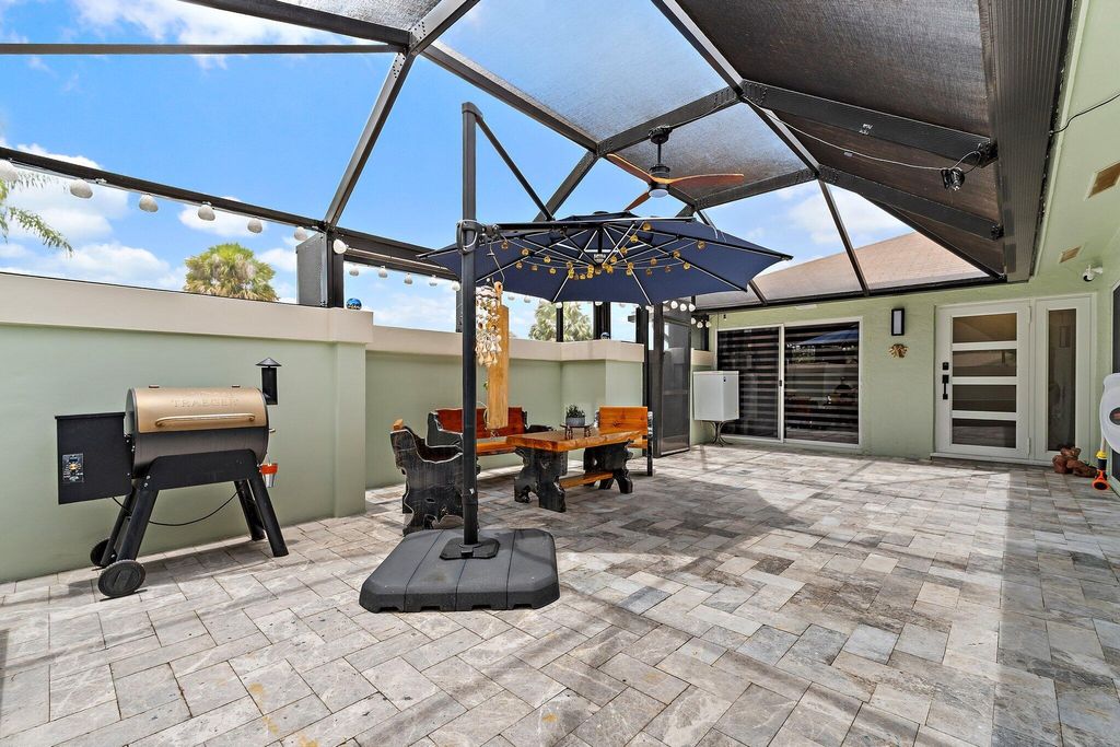 Photo of 109 Bent Arrow Drive #C, Jupiter, FL 33458 (MLS # B26036786)