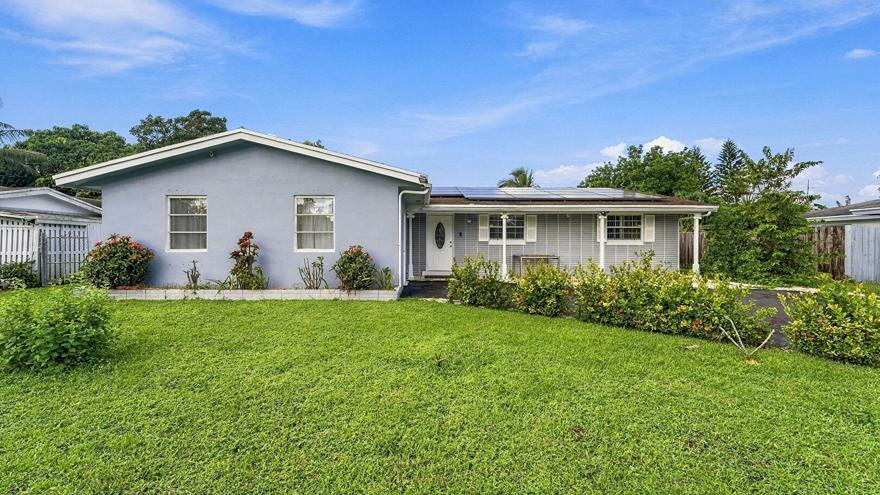 Photo of 1159 Wynnewood Drive, West Palm Beach, FL 33417 (MLS # B26094304)